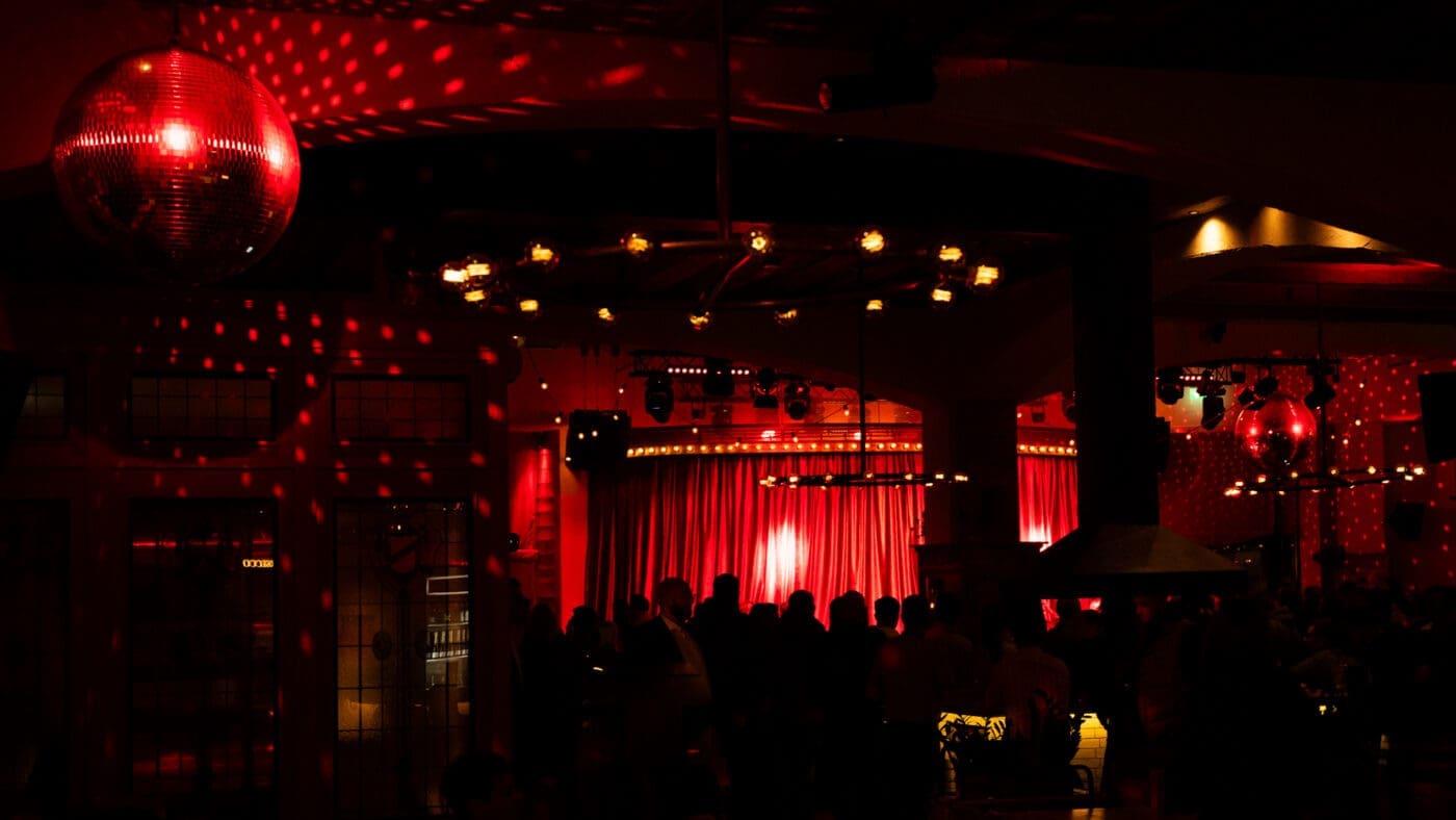 concert space with red theatre curtains