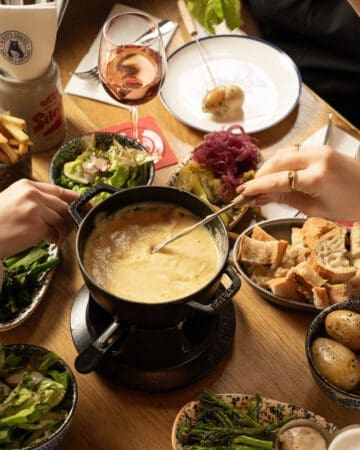 cheese fondue plate with side dishes